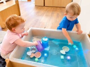 Sensory water play with light-up toys