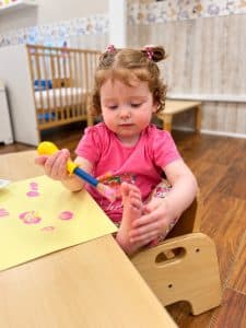 Printing pink shapes at the table
