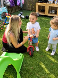 Riding trikes in the garden