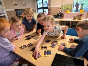 Looking at photographs together at the table